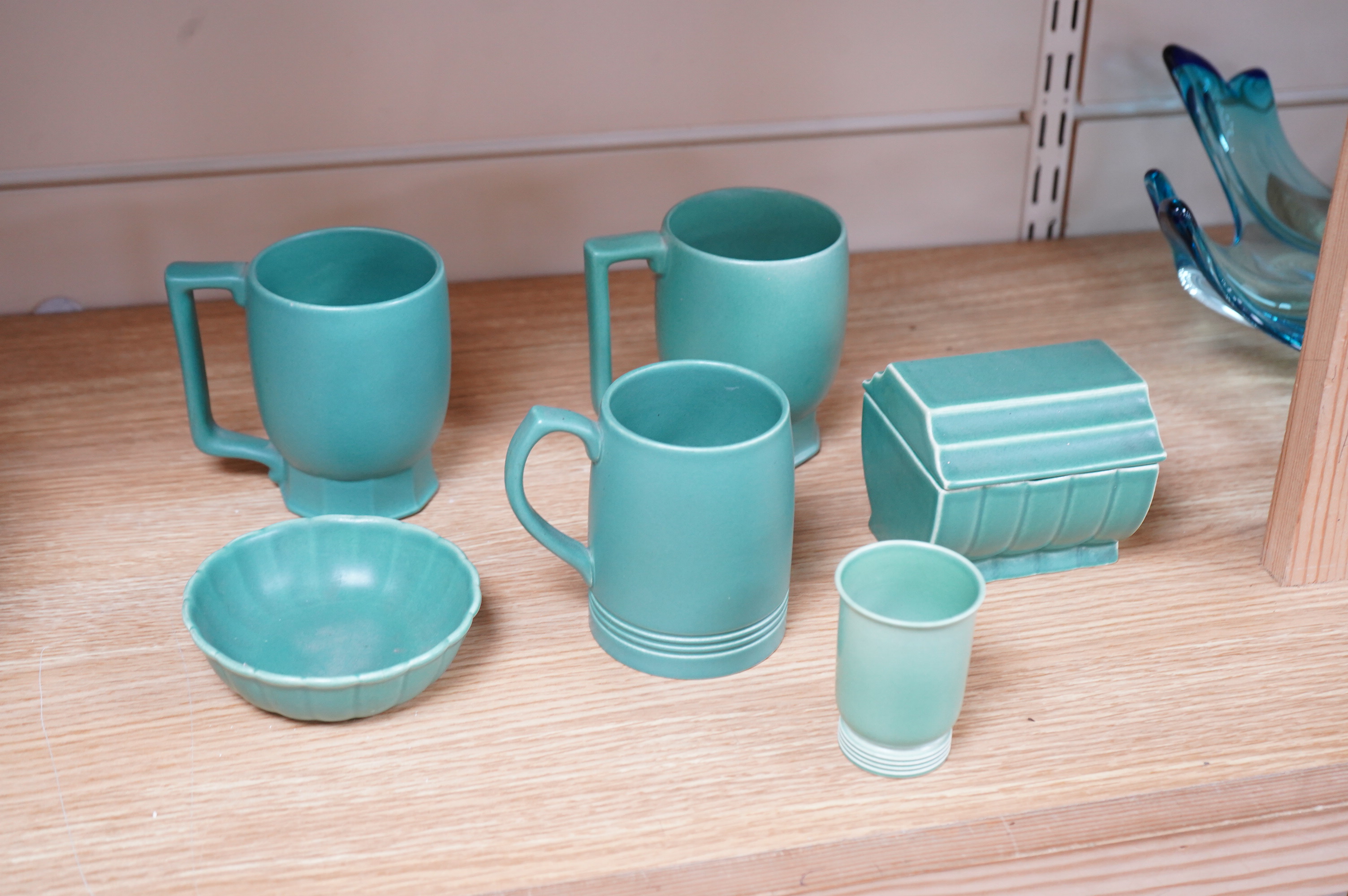 Keith Murray for Wedgwood, three green mugs, cigarette box, fluted dish and small vase, largest 12cm high (6)